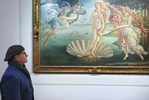 Franco Botticelli contemplating the Masterpiece Birth of Venus by Sandro Botticelli in the Uffizi Gallery in Florence Italy